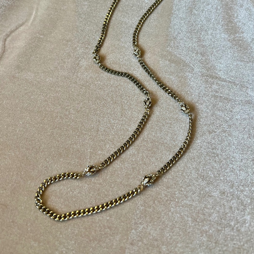Gold tone chain with rhinestone stations elements